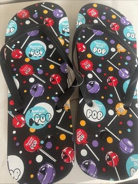 Tootsie Pop Pattern Black Flip Flops